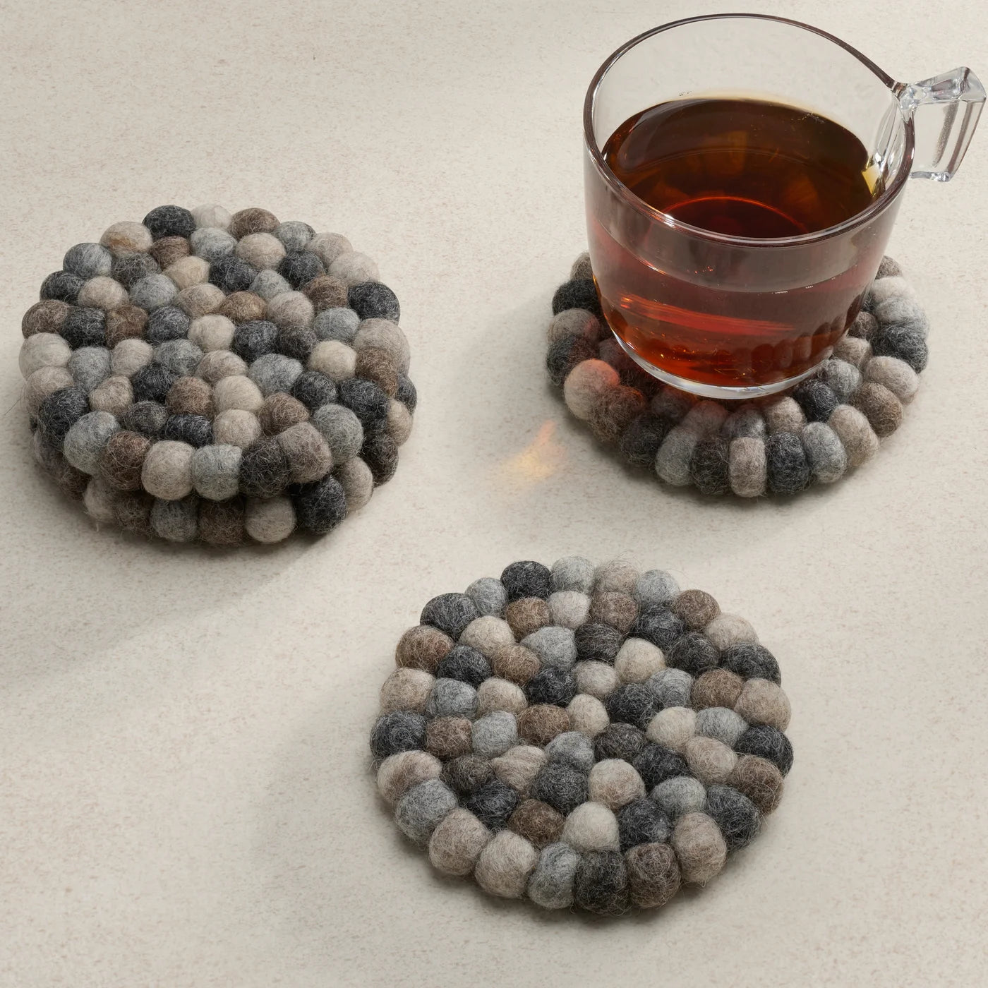 MODWOOL Felt Ball Four Piece Round 4" Diameter Coaster Set | Multi Natural